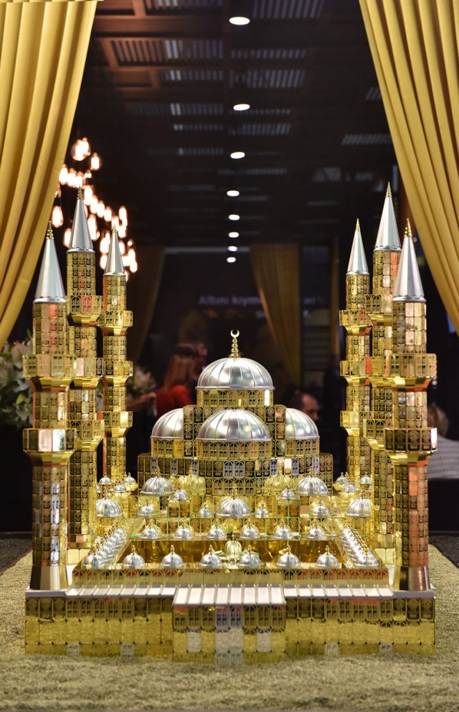 Greeting visitors at the show entrance, a reproduction of the Grand Camlica Mosque in 24karat gold lingots of 100 gr designed by Nadir Gold refinery.
