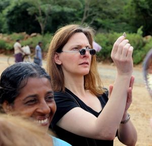 Lisa looking at Sapphire rough in Sri Lanka Photo by C. Tom Schlegel